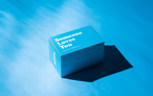 Pictured is SendAFriend's signature blue "Someone Loves You" box