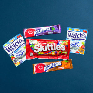 Photo of Candy Pack: Full-size Skittles, two Welch’s Fruit Snacks, and two Airhead candies. Flavors may vary.