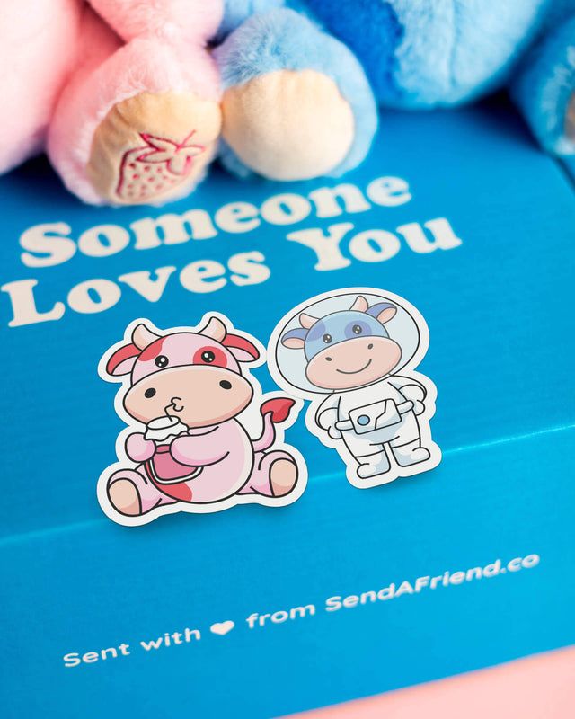 Photo of Sally the Strawberry Cow and Beau the Blueberry Cow stickers
