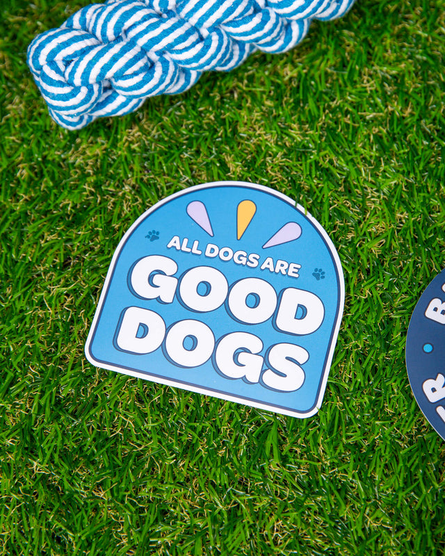 Photo of sticker. Sticker reads All dogs are good dogs