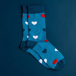 Photo of Valentine's Socks. Socks are blue with red, white, and blue hearts