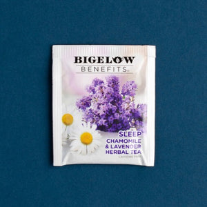 Photo of a chamomile and lavender packaged tea bag on a blue background